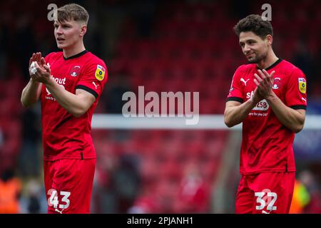 Leyton Orient's Ed Turns (left) and Rob Hunt applaud the fans after the Sky Bet League Two match at Brisbane Road, London. Picture date: Saturday April 1, 2023. Stock Photo