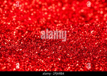 Red Sparkle Fabric Glitter Texture Background Close Up. Stock Photo