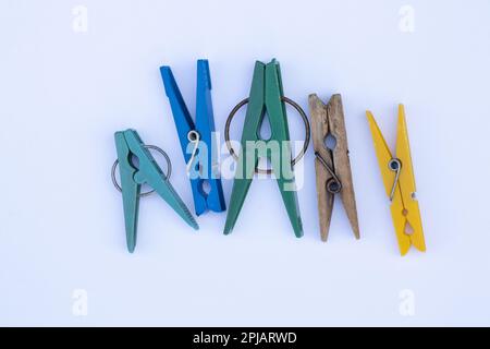 several different countries clothespins on an isolated background Stock Photo