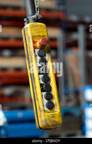 Remote control driving in an industrial warehouse, France Stock Photo