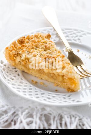 Piece of homemade delicious apple pie on white plate Stock Photo