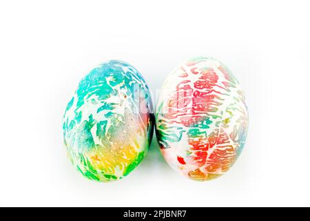 multicolored eggs on white background Stock Photo