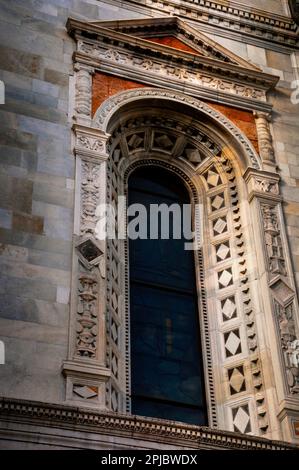 Carved recessed arch window at the Como Duomo in Como, Italy. Stock Photo