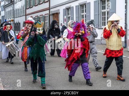 clique at the Basel Switzerland Carnival or Fasnacht children's parade Stock Photo