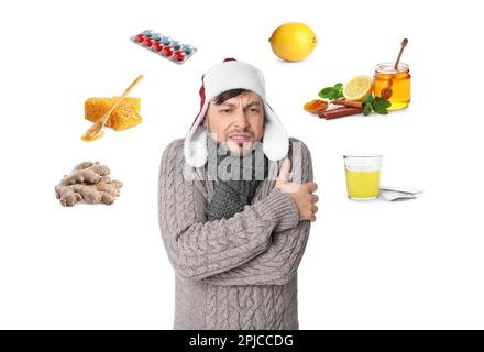 SIck man surrounded by different drugs and products for illness treatment on white background Stock Photo