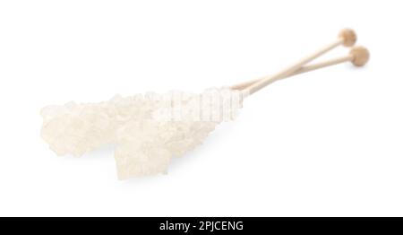 Wooden sticks with sugar crystals isolated on white. Tasty rock candies Stock Photo