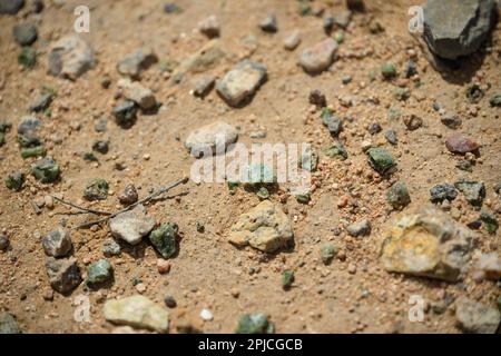 Pieces of Trinitite, a green glass-like substance that was created from sand and other materials due to the intense heat from the first atomic bomb test, are scattered on the ground at the Trinity Site on April 1, 2023 at the White Sands Missile Range, New Mexico. The first atomic bomb was tested at 5:29:45 a.m. Mountain War Time on July 16, 1945 at the Trinity Site which is open to the public twice a year - the first Saturday in April and third Saturday in October. (Photo by Sam Wasson/Sipa USA) Credit: Sipa USA/Ģ����ý Live News Stock Photo