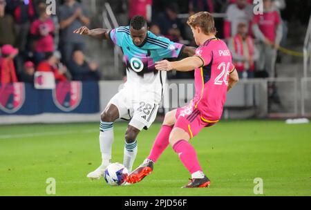 St. Louis, United States. 01st Apr, 2023. St. Louis SC Tim Parker (R) kicks the ball free from Minnesota United Mender Garcia in the first half at City Park in St. Louis on Saturday, April 1, 2023. Photo by Bill Greenblatt/UPI Credit: UPI/Alamy Live News Stock Photo