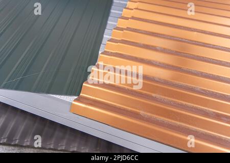 Metal Corrugated roofing profiles in metal roofing factory Stock Photo