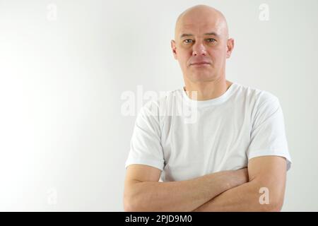 Handsome older man looking at the camera smiling. High quality photo Stock Photo