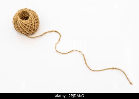 Burlap jute twine coil skeins isolated on white-165908