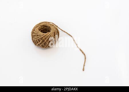 Jute rope bundle on white isolated background Stock Photo