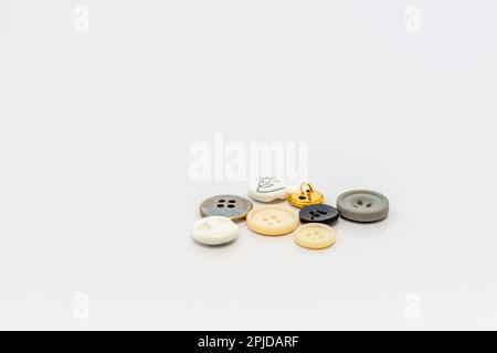 Buttons for clothes on white background. selective focus Stock Photo