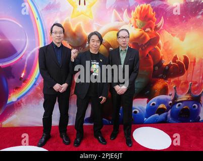 Takumi Kawagoe, Shigeru Miyamoto, Koji Kondo 04/01/2023 The Special  Screening of The Super Mario Bros. Movie held at the Regal LA Live in Los  Angeles, CA Photo by Izumi Hasegawa/HollywoodNewsWire.net Credit:  Newscom/Alamy