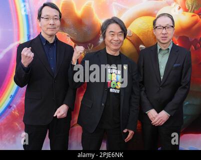 Takumi Kawagoe, Shigeru Miyamoto, Koji Kondo 04/01/2023 The Special  Screening of The Super Mario Bros. Movie held at the Regal LA Live in Los  Angeles, CA Photo by Izumi Hasegawa/HollywoodNewsWire.net Credit:  Newscom/Alamy