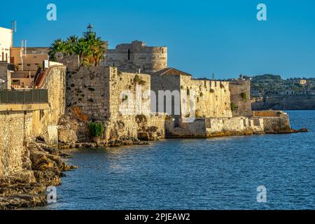 Glimpses and panoramas of the 13th century military fortress, Castello Maniace, overlooking the sea on the island of Ortigia. Syracuse, Sicily, Italy Stock Photo