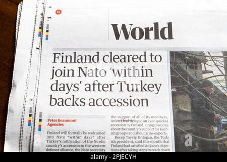 'Finland cleared to join Nato 'within days' after Turkey backs accession' Guardian newspaper headline cutting  31 March 2023 London England UK Stock Photo