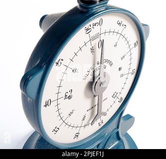 A vintage cast iron weight scale on a white isolated background - 3D render Stock Photo