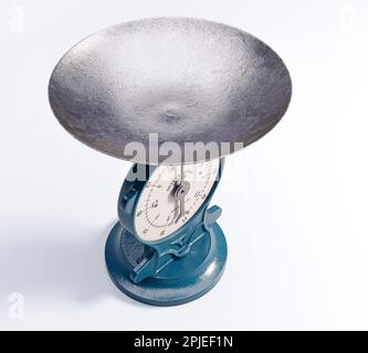 A vintage cast iron weight scale on a white isolated background - 3D render Stock Photo