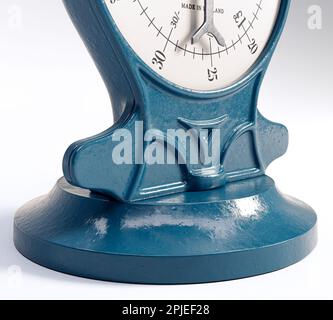 A vintage cast iron weight scale on a white isolated background - 3D render Stock Photo