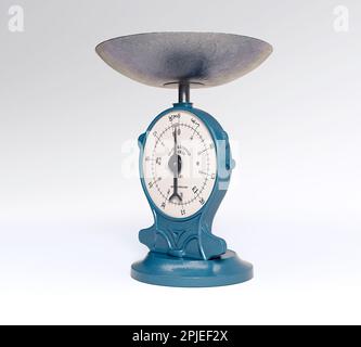 A vintage cast iron weight scale on a white isolated background - 3D render Stock Photo