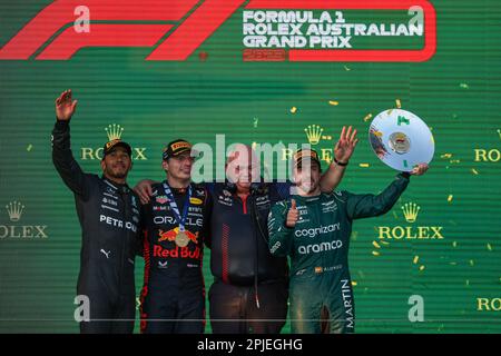 Melbourne, Australia. 2nd Apr, 2023. First placed Red Bull driver Max Verstappen of the Netherlands (2nd L), second placed Mercedes driver Lewis Hamilton (1st L) of Britain and third placed Aston Martin driver Fernando Alonso (1st R) of Spain celebrate on the podium after the Australian Formula One Grand Prix in Melbourne, Australia, April 2, 2023. Credit: Qian Jun/Xinhua/Alamy Live News Stock Photo