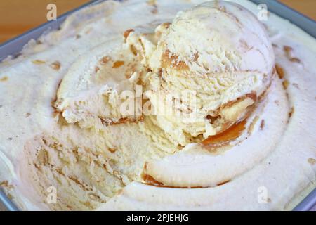 Closeup of Mouthwatering Salted Caramel Macadamia Nut Ice Cream Stock Photo