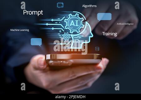 Businessman using chatbot on smartphone with Artificial Intelligence Stock Photo