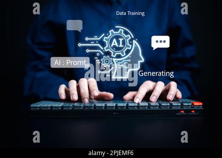 Businessman using chatbot on computer with Artificial Intelligence Stock Photo