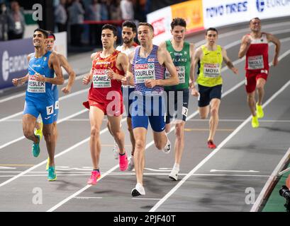 Ossama Meslek of Italy and Neil Gourley of Great Britain & NI competing in the men’s 1500m heats at the European Indoor Athletics Championships at Ata Stock Photo