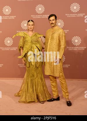 Mumbai, India. 01st Apr, 2023. French visual artists and Instagrammers Isabelle Chaput (L) and Nelson Tiberghien (R) pose for a photo shoot on the red carpet during the second day of the opening of Nita Mukesh Ambani Cultural Centre in Mumbai, India, 01 April, 2023. (Photo by Indranil Aditya/NurPhoto) Credit: NurPhoto SRL/Alamy Live News Stock Photo