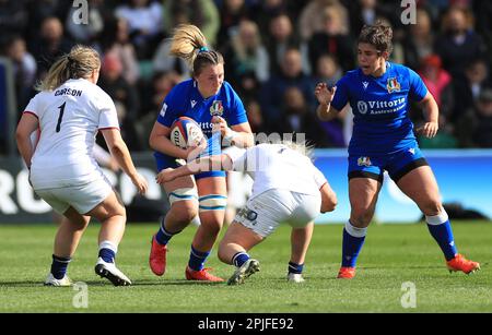 Italy’s Francesca Sgorbini (second left) is tackled by England’s Marlie Packer (second right) and Mackenzie Carson (left) during the TikTok Women's Six Nations match at the cinch Stadium at Franklin's Gardens, Northampton. Picture date: Sunday April 2, 2023. Stock Photo