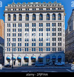 One Broadway, once the anchor of Steamship Row, is a white limestone shell hiding a red brick Queen Anne style office building below. Stock Photo