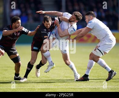 Saracens Alex Goode is tackled by Ospreys Owen Williams during the Heineken Champions Cup round of 16 match at the StoneX Stadium, London. Picture date: Sunday April 2, 2023. Stock Photo