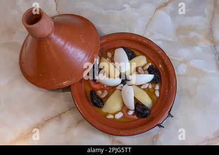 Tunisian dishe culinary Still Life. Tagine with prunes and almonds Stock Photo