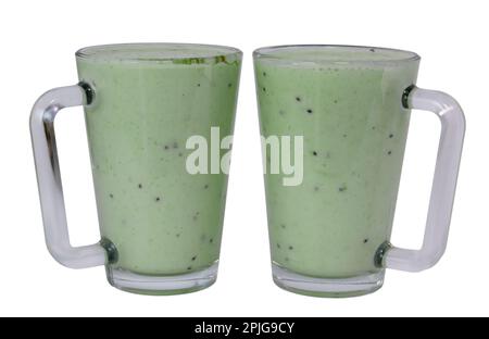 Kiwi and milk smoothie in a transparent cup on a white background Stock Photo