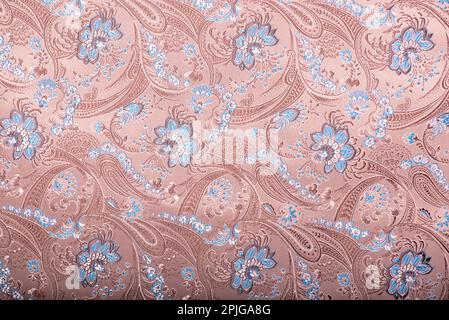 Beautiful pattern with ornament from embroidered blue flowers. Fashion design. mbroidered pattern background with ornamental flowers on pink backgroun Stock Photo