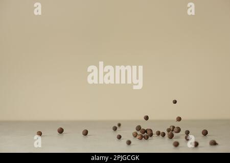 A handful of different spices on the table, side view, culinary background Stock Photo