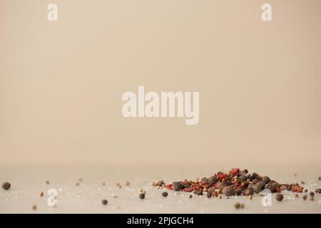 A handful of different spices on the table, side view, culinary background Stock Photo