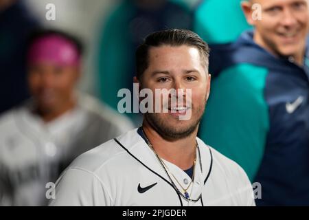 Seattle Mariners' Ty France smiles in the dugout after hitting a three-run  home run against the Cleveland Guardians in the eight inning during an  opening day baseball game Thursday, March 30, 2023