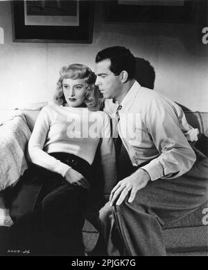 BARBARA STANWYCK and FRED MacMURRAY in DOUBLE INDEMNITY 1944 director BILLY WILDER novel James M. Cain screenplay Raymond Chandler costume design Edith Head Paramount Pictures Stock Photo