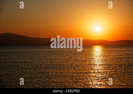 A beautiful summer sunset at Plaka Beach, Naxos, Greece Stock Photo