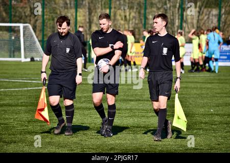 Teesside, UK. 02 Apr 2023. The match officials leaving the pitch after Middlesbrough Women FC (in red and white) played Stockport County Ladies FC in the FA Women’s National League Division One North. The visitors won 1-6 at the Map Group UK Stadium in Stockton-on-Tees - a scoreline which was harsh on the home side. Credit: Teesside Snapper/Alamy Live News Stock Photo