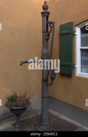 Historical fresh water pump in the Jakob Fugger settlement, the oldest social settlement in the world, 16th century, Augsburg, Bavaria, Germany, Europ Stock Photo