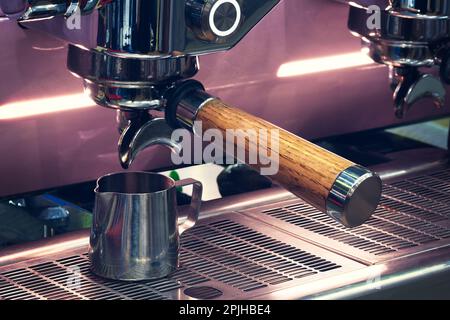 coffee extraction from professional coffee machine with bottomless filter Stock Photo