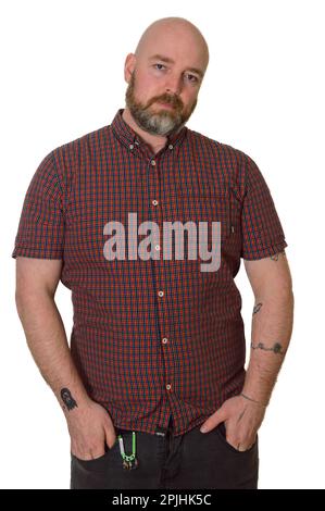 Tattooed Skinhead With Beard in Checked Shirt on White Background Stock Photo