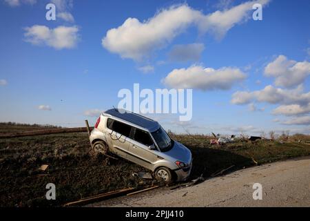 STINESVILLE, INDIANA - APRIL 1: A car rests on the shoulder of West Wolf Mountain Road on April 1, 2023 in Stinesville, Indiana. A tornado struck the area on March 31, 2023, and destroyed houses along the road, and hospitalized some residents with injuries. Two people were killed nearby at McCormick’s Creek State Park when the tornado destroyed a camp ground. (Photo by Jeremy Hogan/The Bloomingtonian) Stock Photo