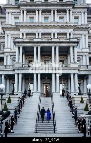 P20210120AC-0892-2: Vice President Kamala Harris and her husband Mr. Doug Emhoff walk up the Navy Steps of the Eisenhower Executive Office Building at the White House Wednesday, Jan. 20, 2021, to visit the Vice President’s ceremonial office for the first time. (Official White House Photo by Ana Isabel Martinez Chamorro) Stock Photo