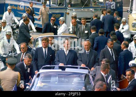 ST-C230-35-63      26 June 1963 Trip to Europe: Germany, West Berlin: President Kennedy in motorcade with Willy Brandt, Mayor of West Berlin and Konrad Adenauer, Chancellor of West Germany  Please credit 'Cecil Stoughton. White House Photographs. John F. Kennedy Presidential Library and Museum, Boston' Stock Photo