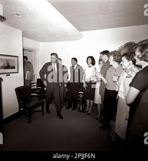 KN-C28773                  29 May 1963 White House staff celebrate President John F. Kennedy's birthday with JFK and Jacqueline Kennedy in the Navy Mess Hall.  Please credit 'Robert Knudsen. White House Photographs. John F. Kennedy Presidential Library and Museum, Boston' Stock Photo
